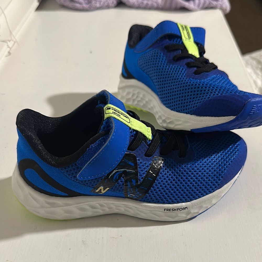 New Balance blue and black shoes (new never used)
